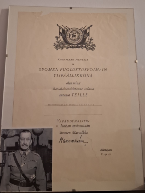 The Liberty Cross II class merit medal and was signed by Finland's Field Marshal Carl Gustav Mannerheim in 1943 at the height of WW2. Marshal Mannerheim is Finland's greatest hero during its modern history.